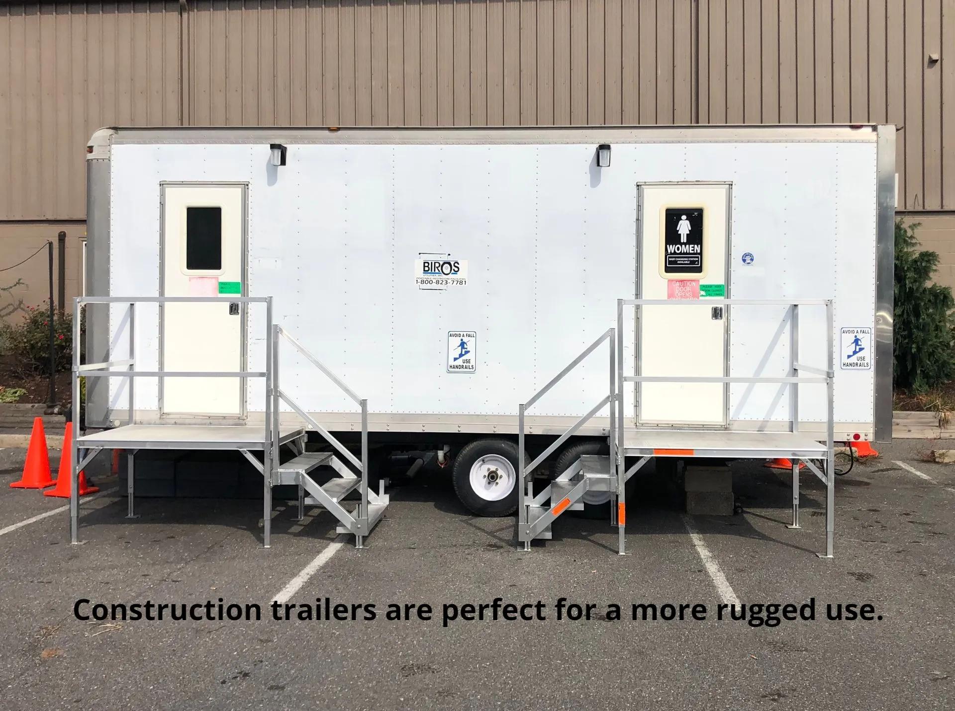 external view of Mens and Women's construction toilet trailers.