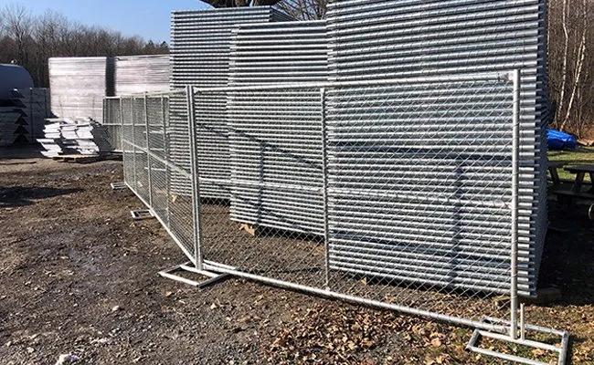 Image of temporary fencing behind a temporary fence wall.